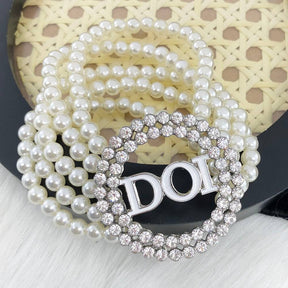 DOI Bracelet - White Pearls & Charm - Bricks Masons